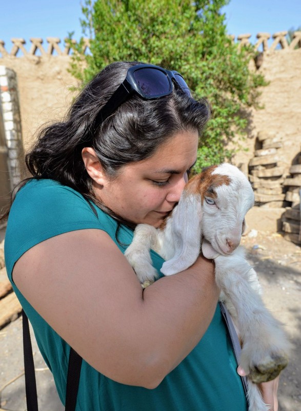 Kelsey Kissing a Baby Goat in Egypt