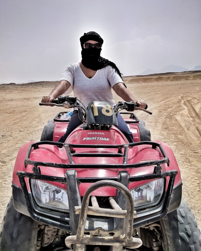 Kelsey on an ATV in the desert outside Hurghada